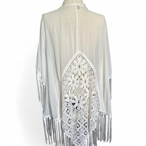 White Torrid crochet fringe kimono